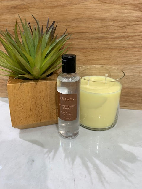 Balancing Skin Toner with plant and candle